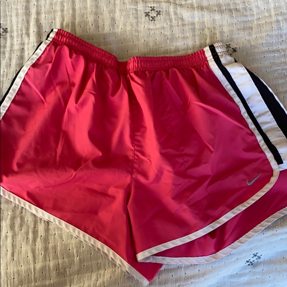 Pink Nike running shorts